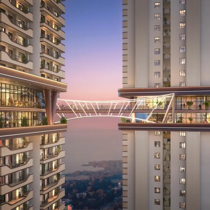 LINQ by Raghava — The illuminated double-deck bridge connecting paired towers